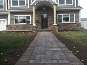 cultured stone around door and porch stoop columns riverbed cambridge pavers ledgestone